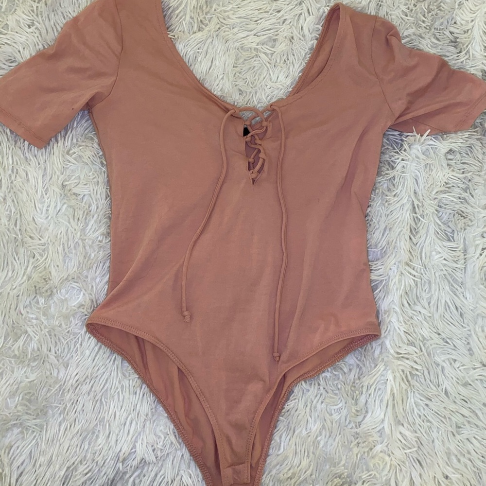 Pink tight bodysuit